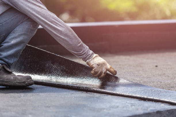 Professional Waterproofing technician working in Belleville, IL
